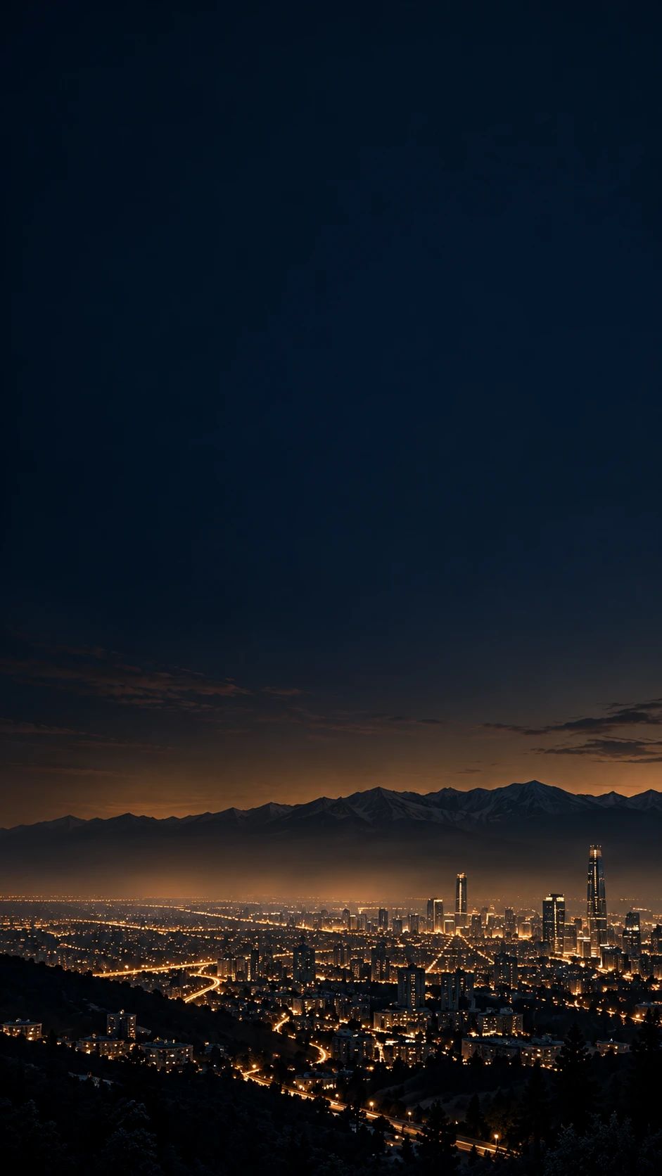 Santiago de noche visto desde lo alto, con la cordillera nevada